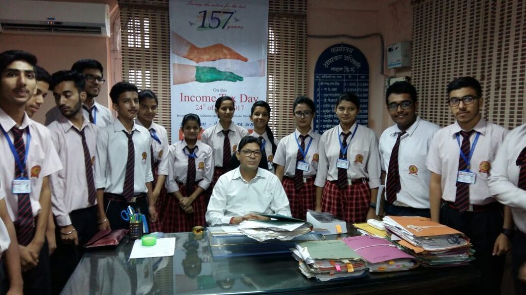 Income Tax Officer Mr. Rajesh Patwal & 10+2 Commerce students.