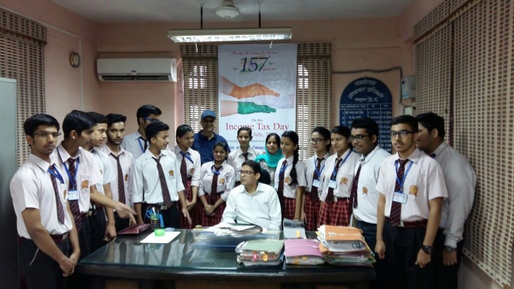 Income Tax Officer Mr. Rajesh Patwal and Mr.Income Tax Commissioner Mr. Vikramjeet interacting with the students.